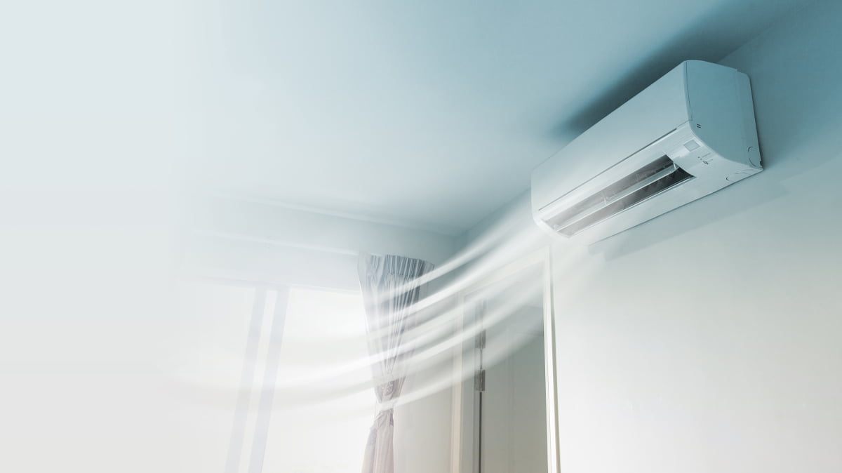 wall mounted unit with visible air showing how air conditioning works