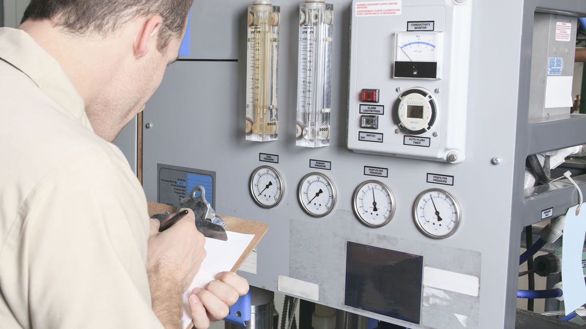 Engineer checking commercial system